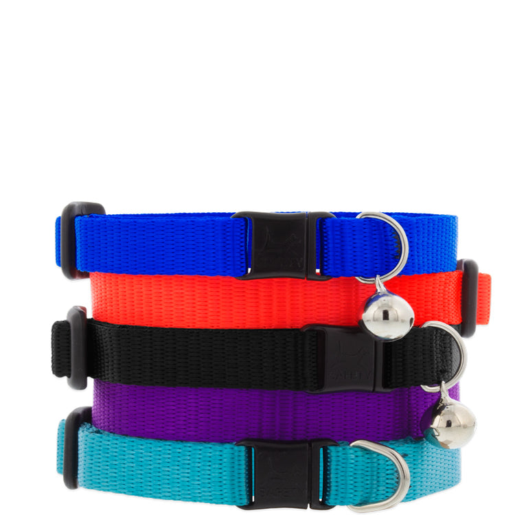 Cat collars with and without bells in Basic Solids in assorted colors on a white background