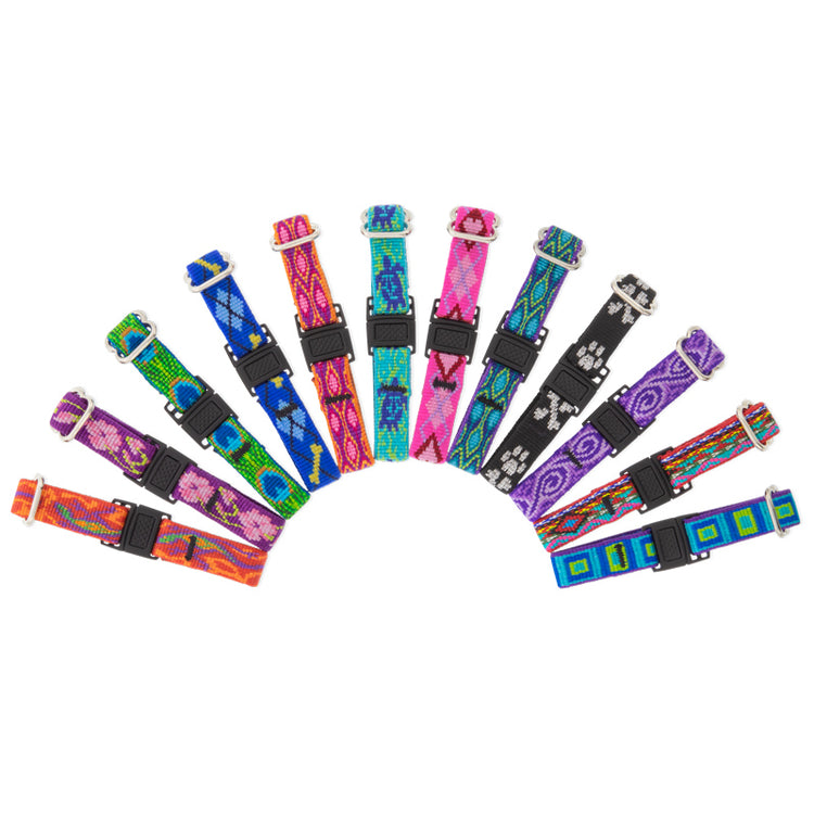 Colorful puppy whelping collars arranged in a circular pattern on a white background