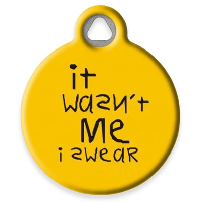 
                    
                      It wasn’t me I swear Pet ID Tag from LupinePet - Golden yellow background with messy writing.
                    
                  